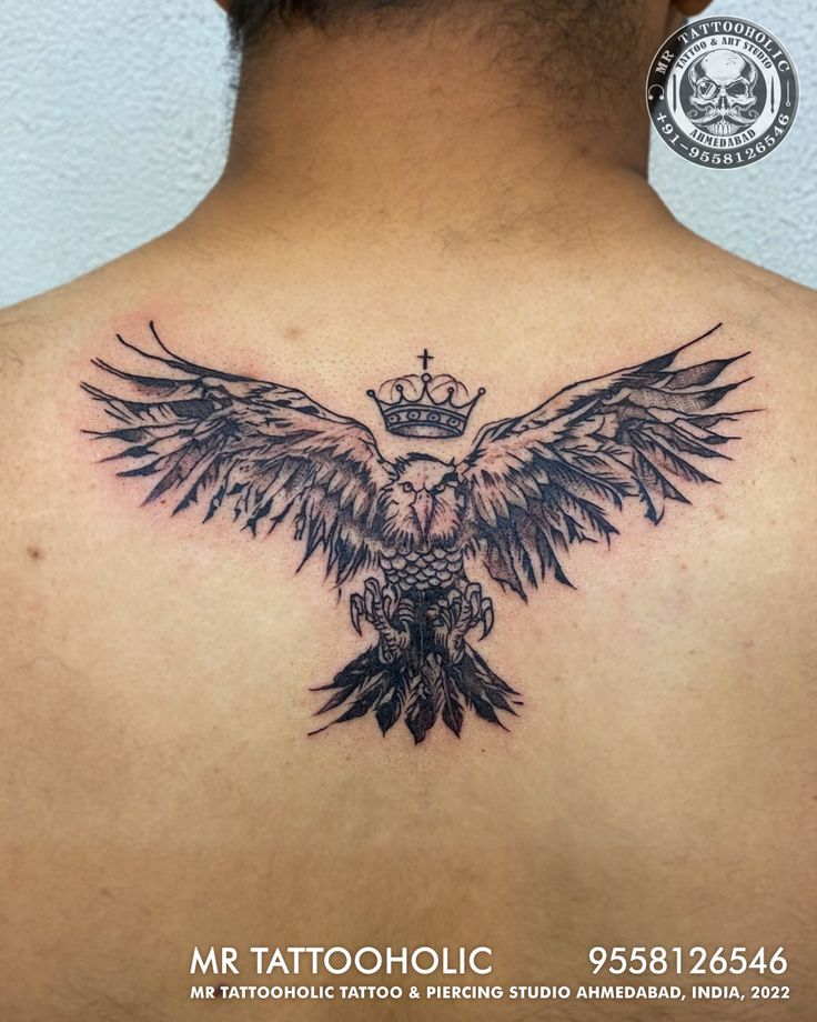 tribal back eagle tattoos for men