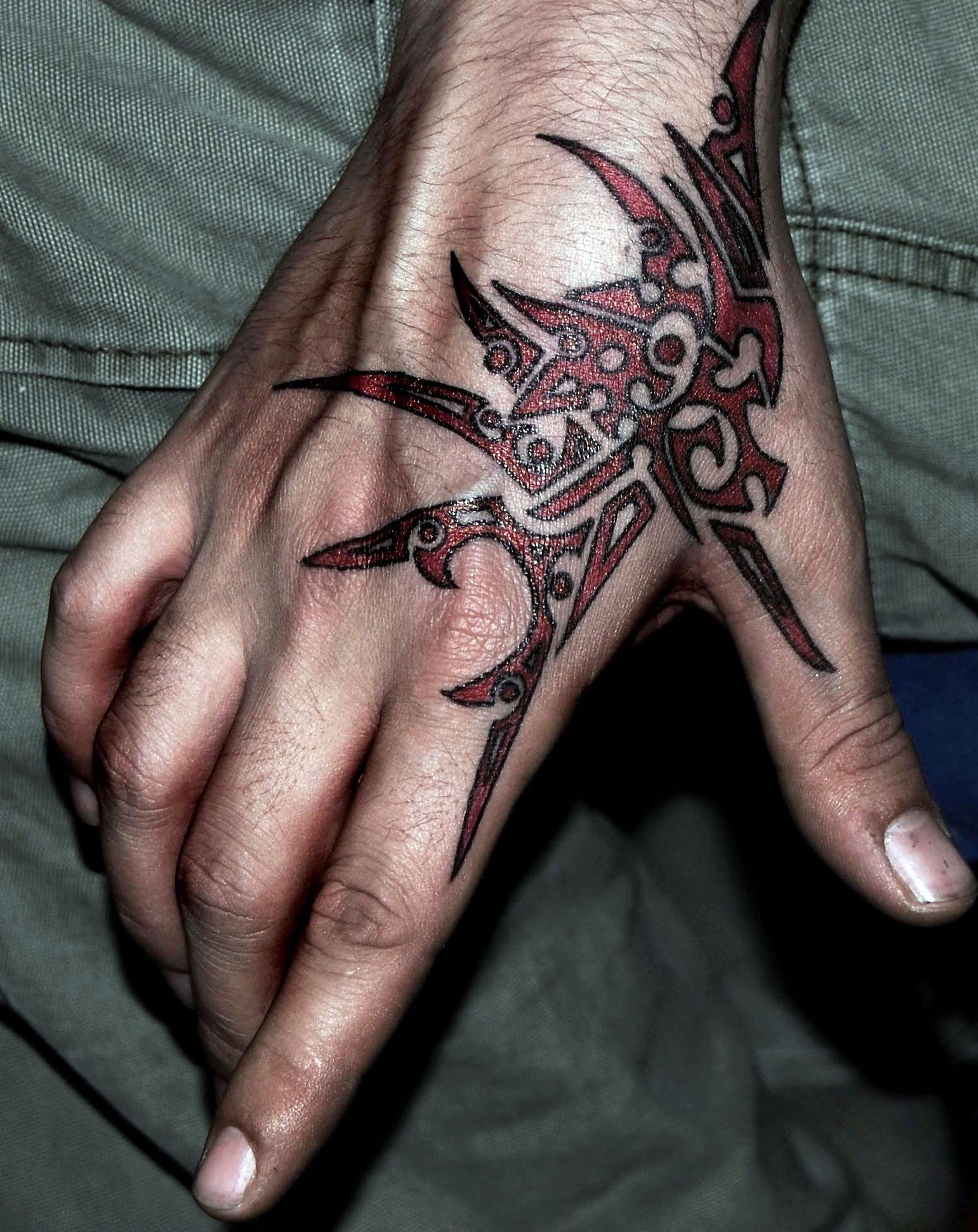 tribal hand tattoo for men