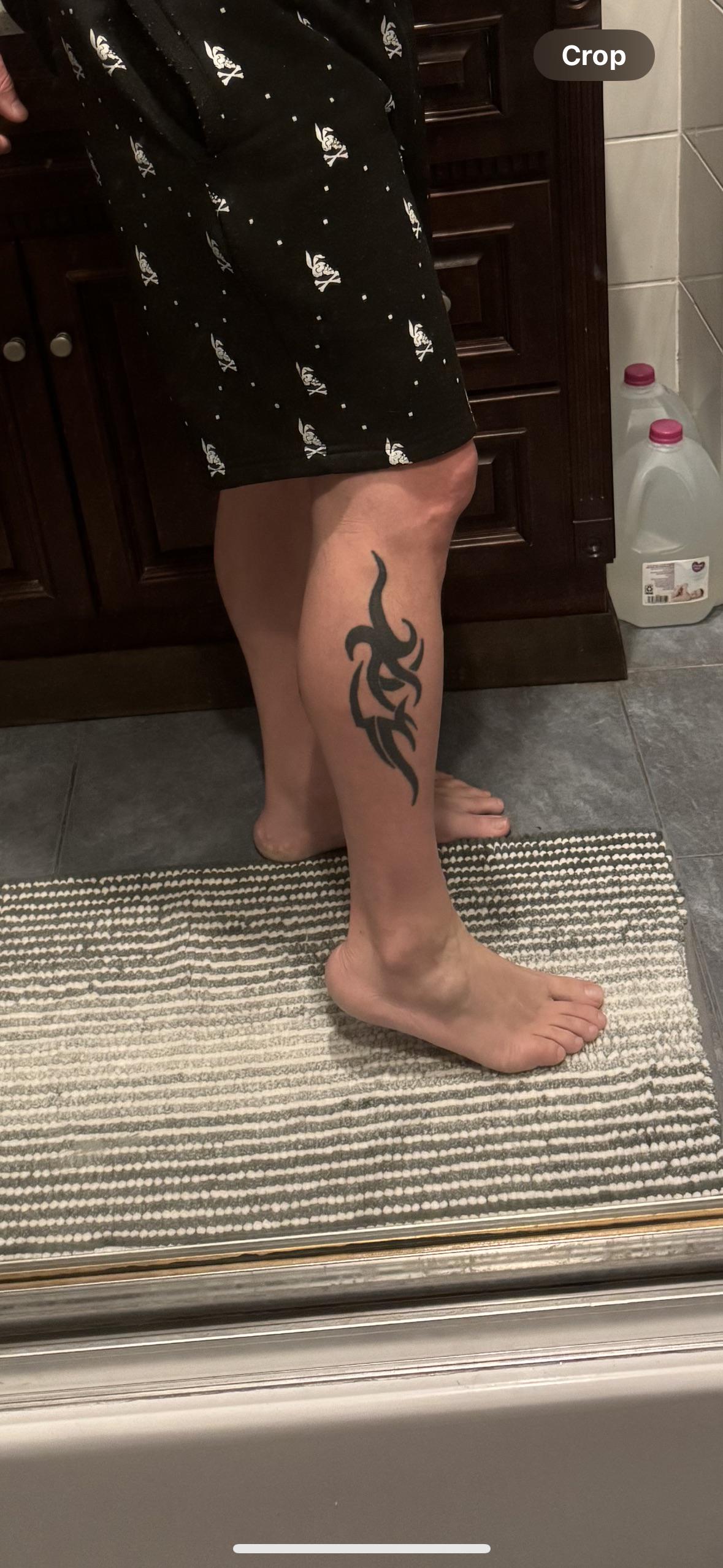 tribal leg tattoos for men meaning