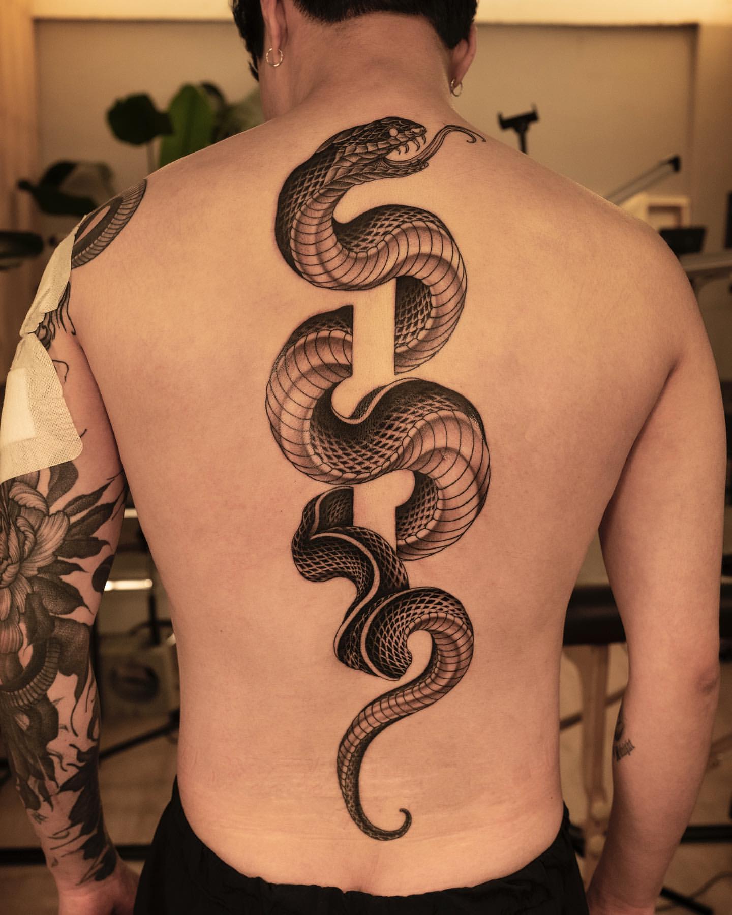 tribal snake tattoos for men.