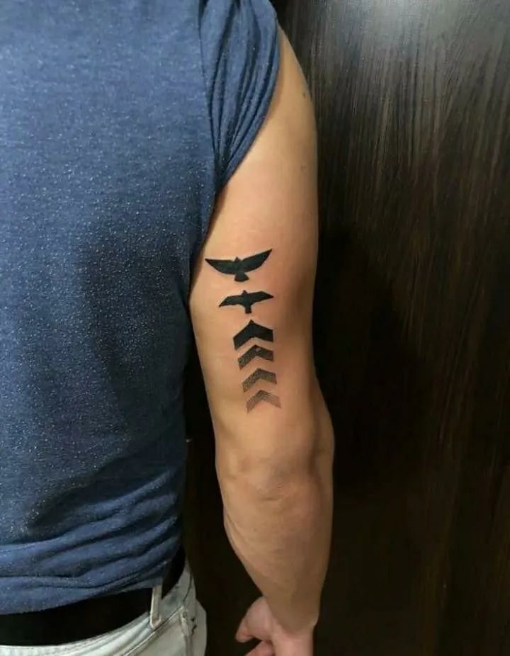 tricep tattoo for men