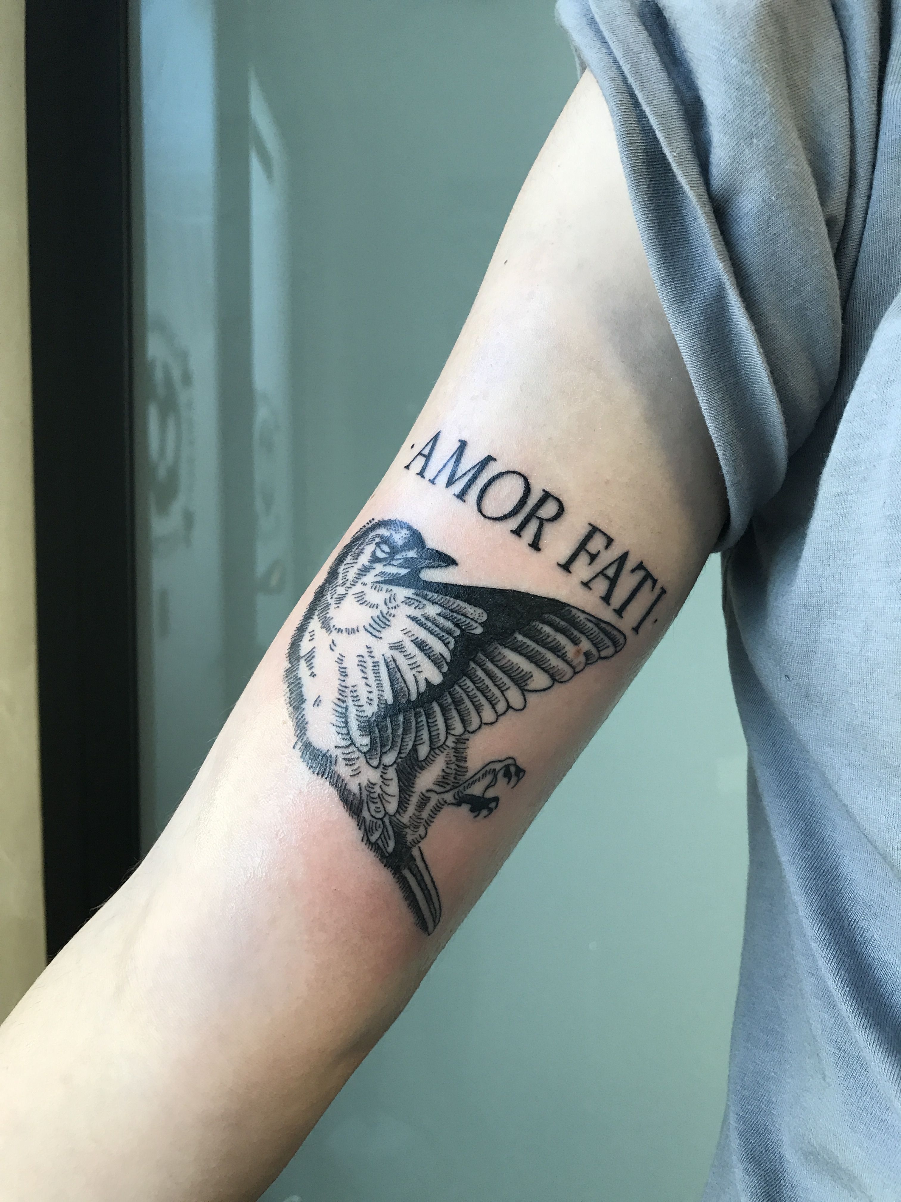 unique amor fati tattoo designs for men