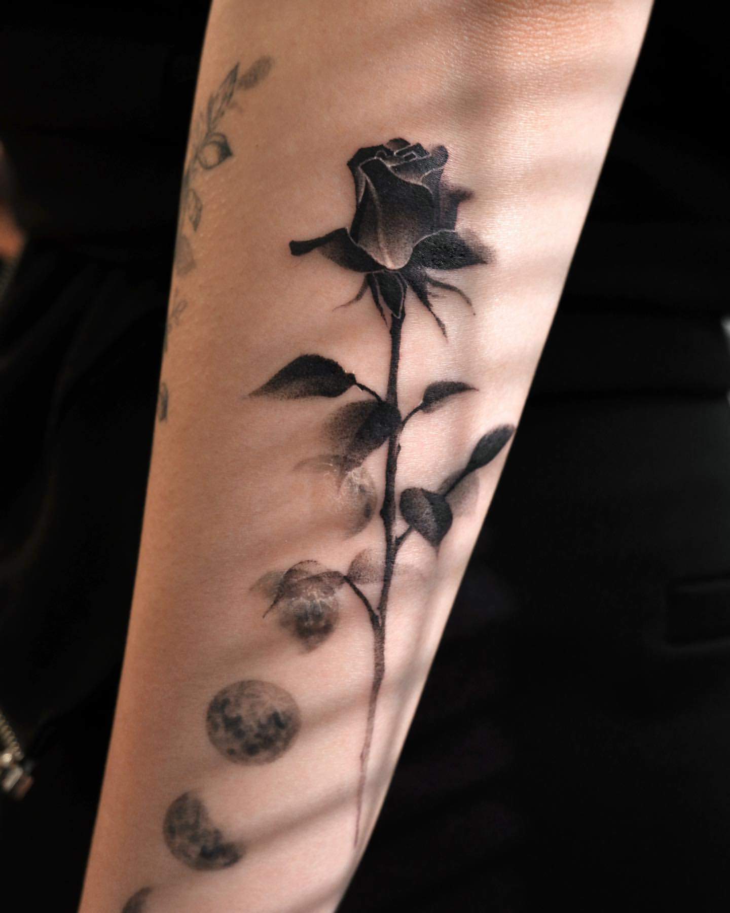 unique black rose tattoos for men