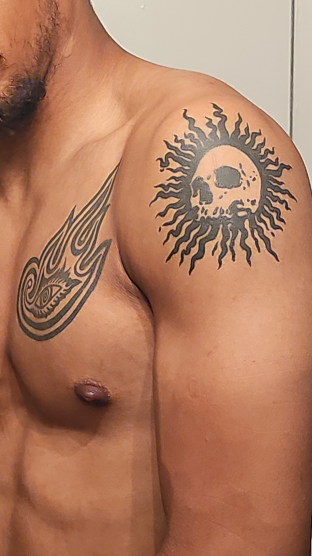 unique chest and shoulder tattoos for men's expression