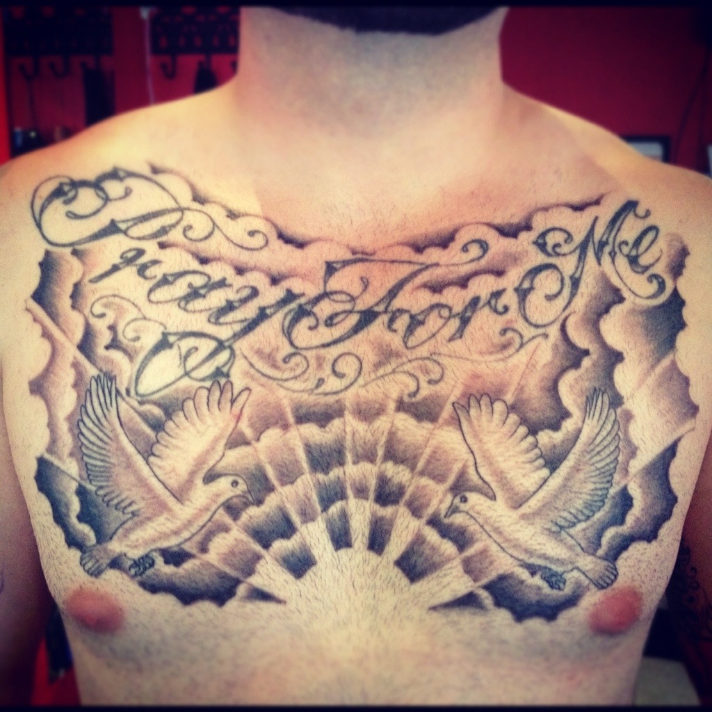 unique chest tattoos for men featuring clouds