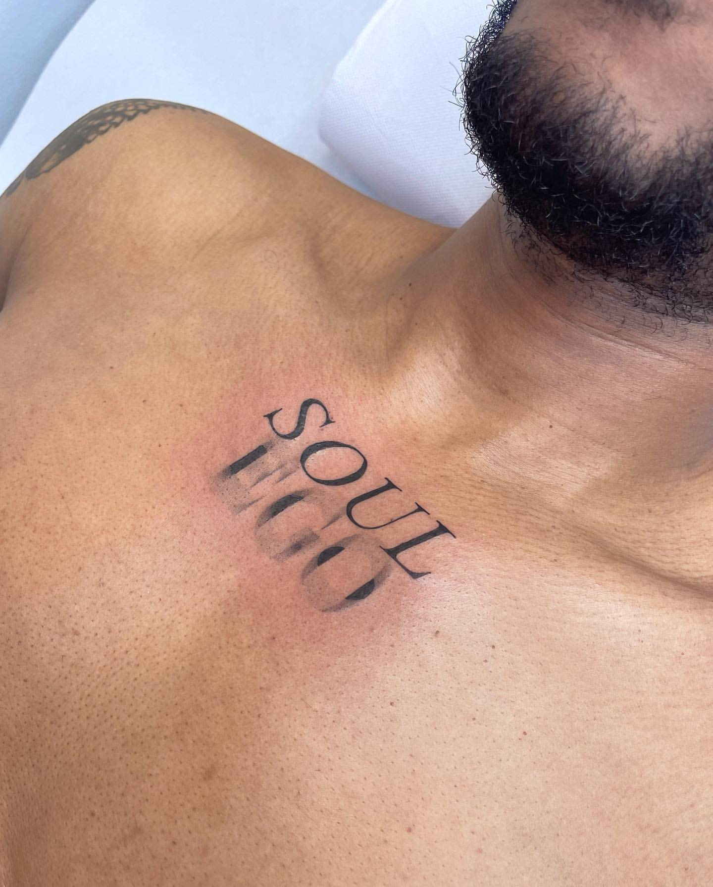 unique chest tattoos words for men