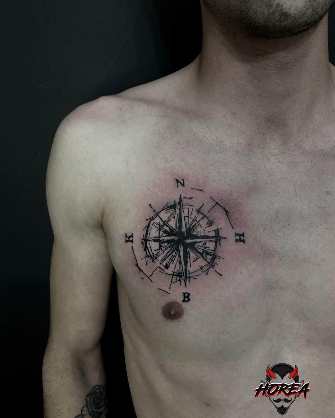 unique compass chest tattoos for men