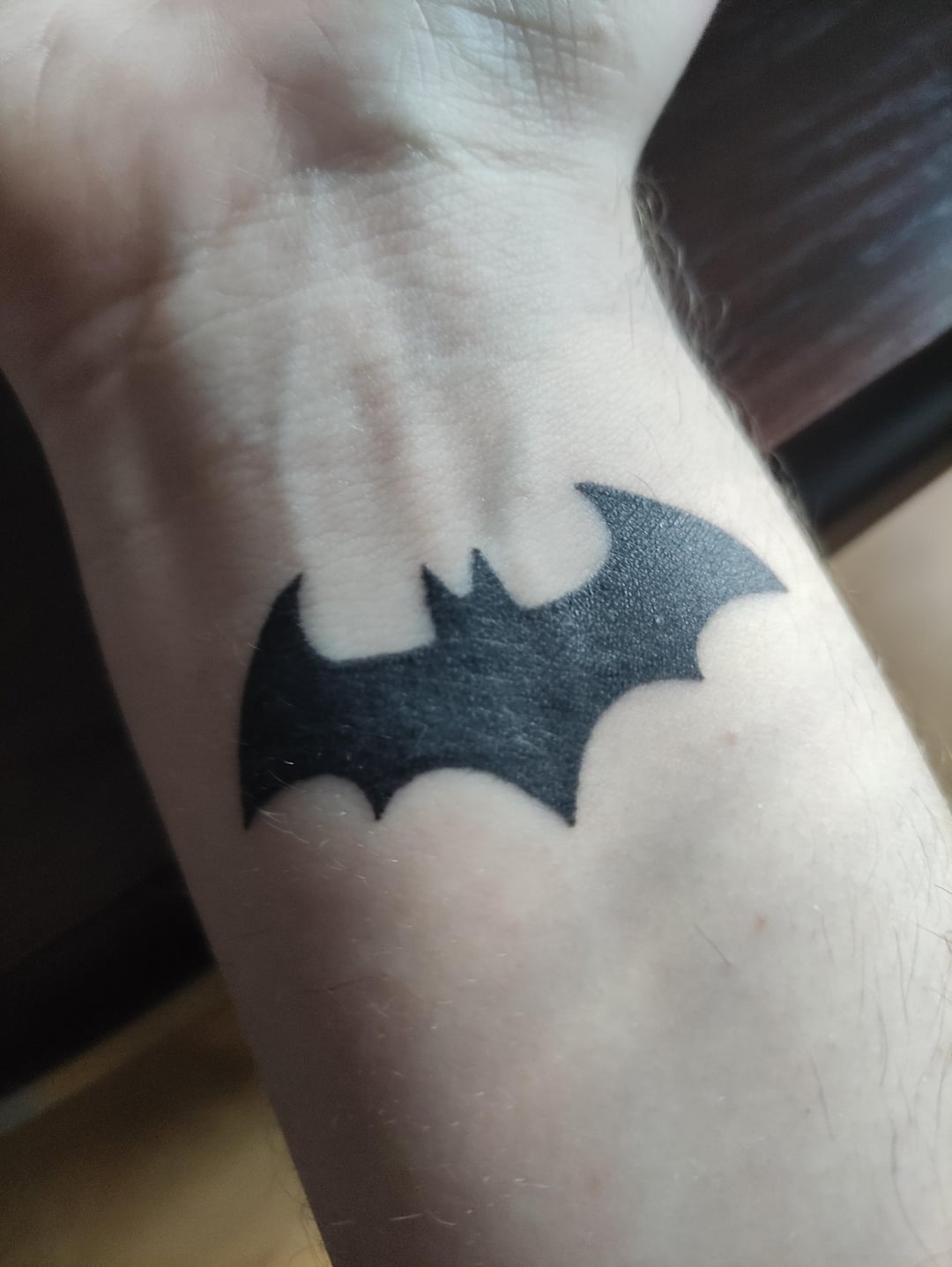 unique designs of Batman tattoos for men