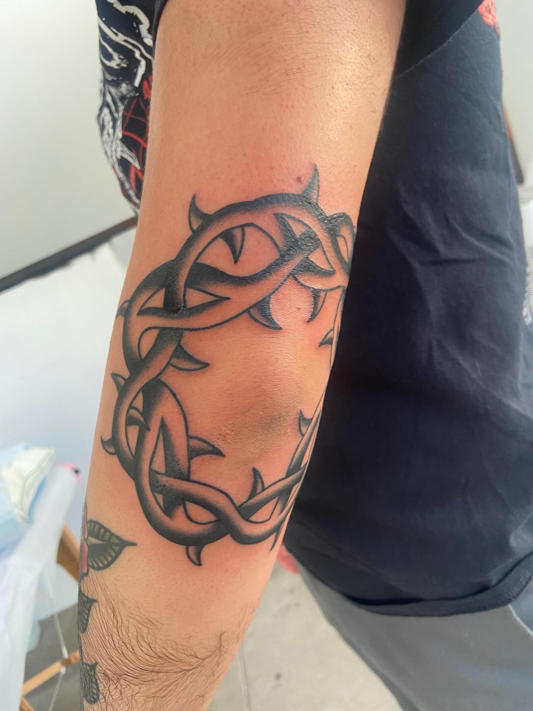 unique elbow tattoo styles for men