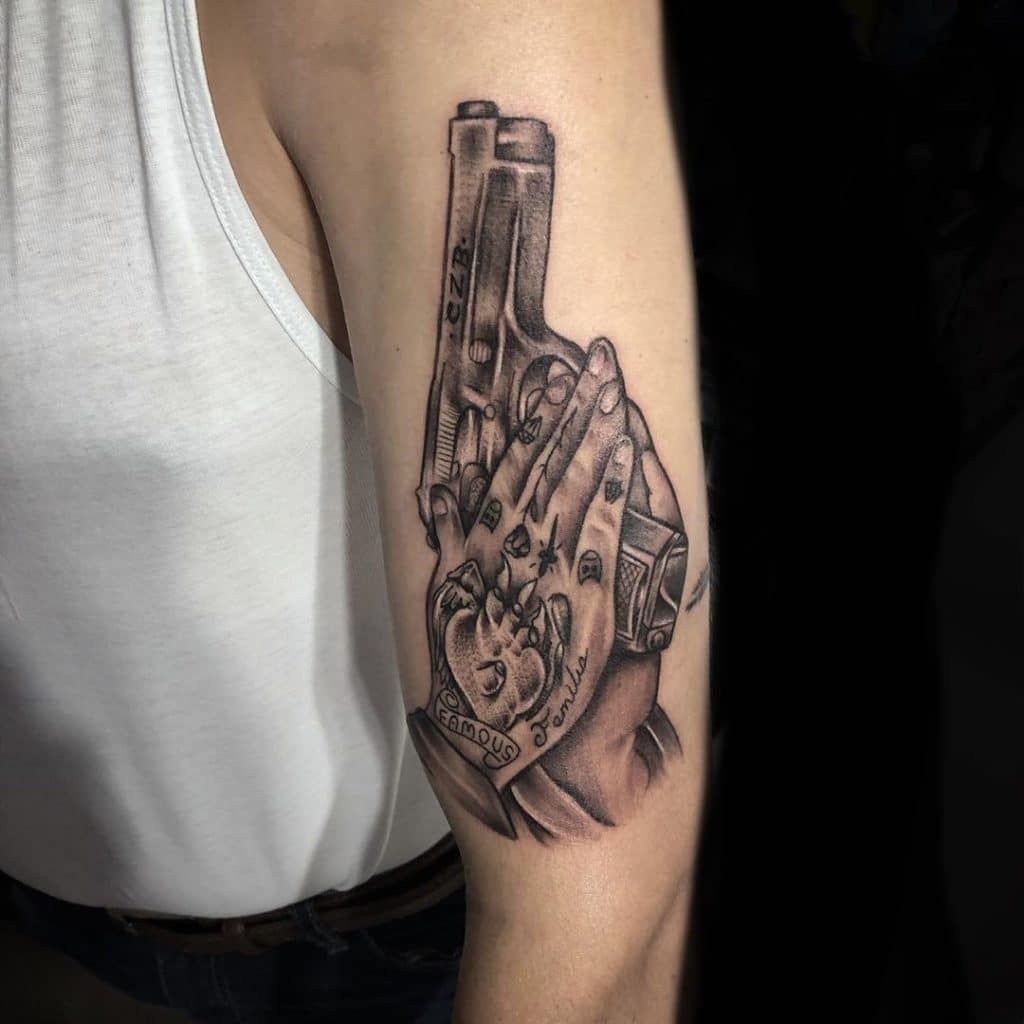 unique gun tattoo styles for men