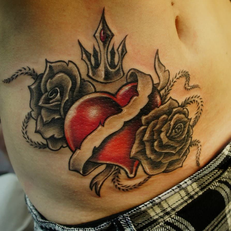 unique heart tattoo placements for men.