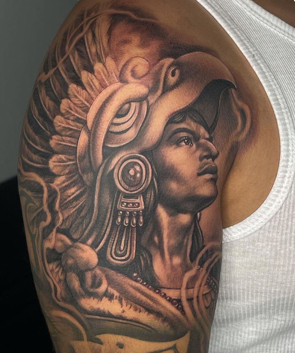 unique interpretations of Aztec warrior chest tattoos for men