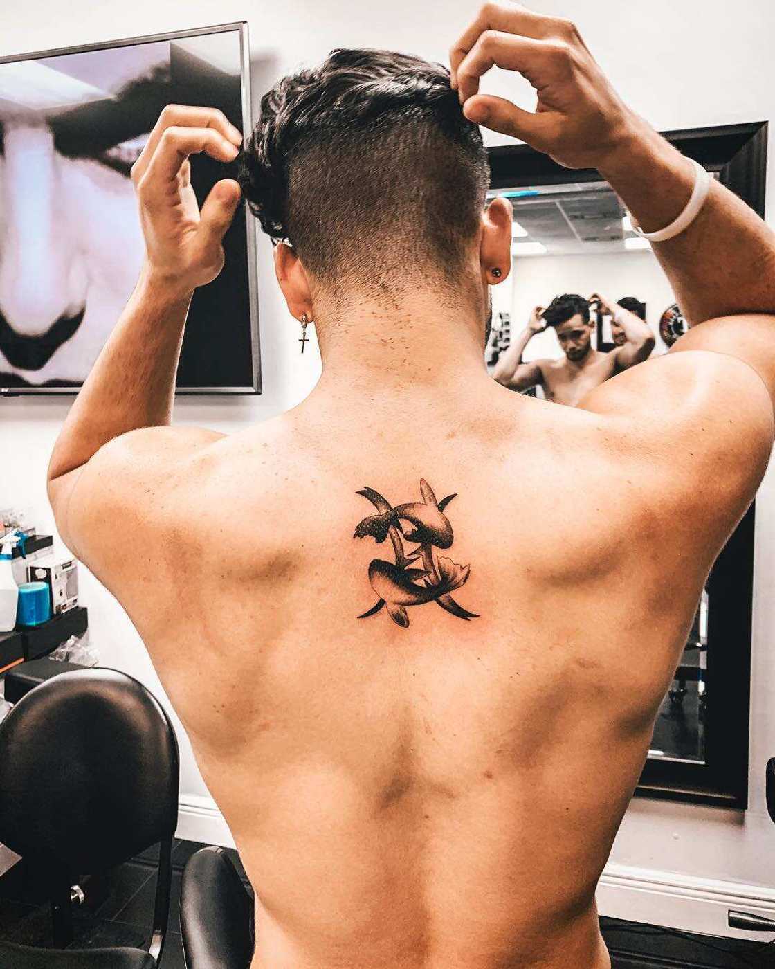 unique Pisces tattoos for men