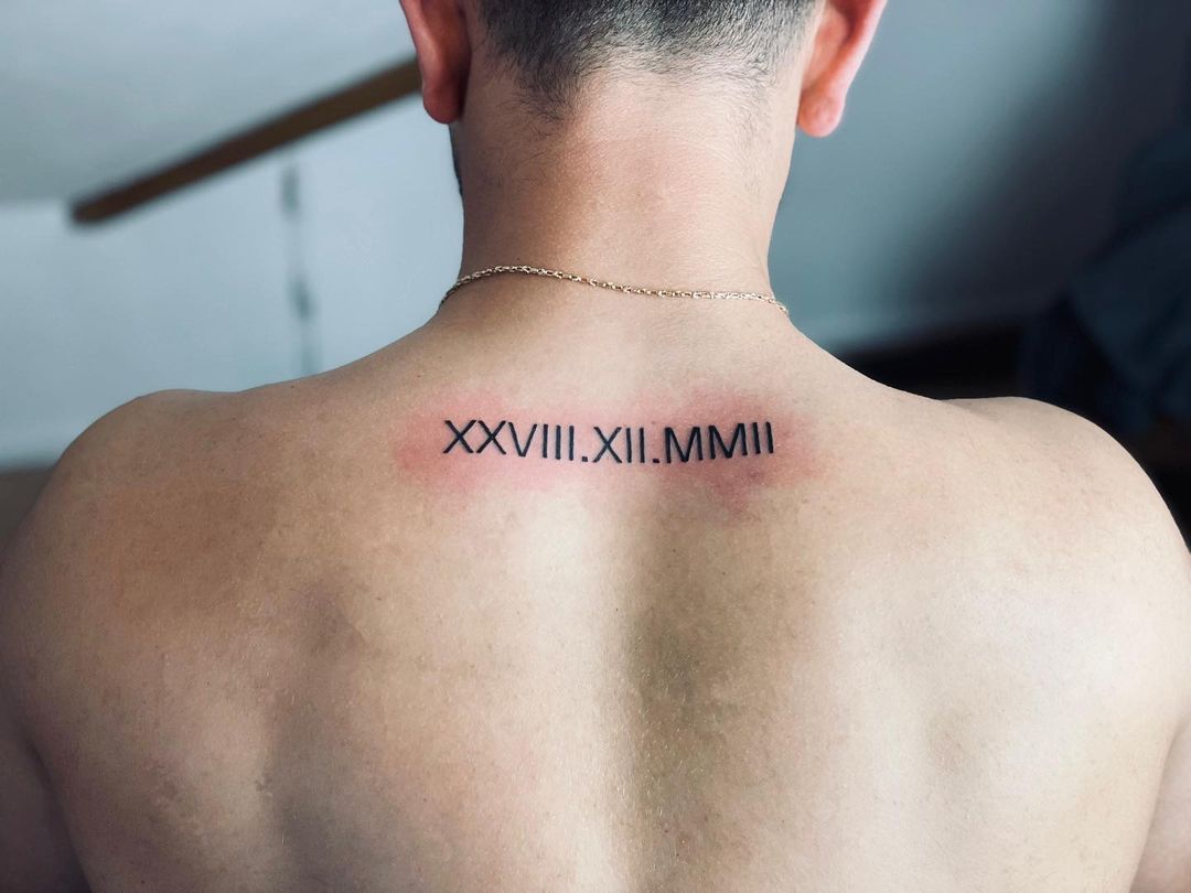 unique small tattoos for men on back ideas