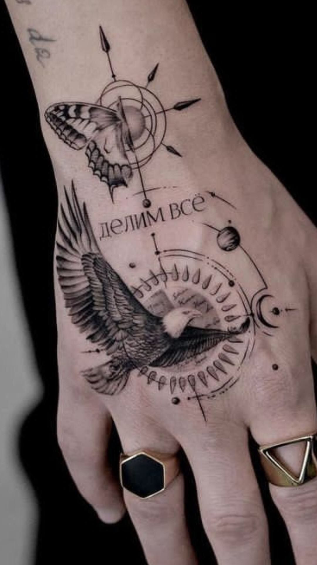 unique symbol hand tattoos for men