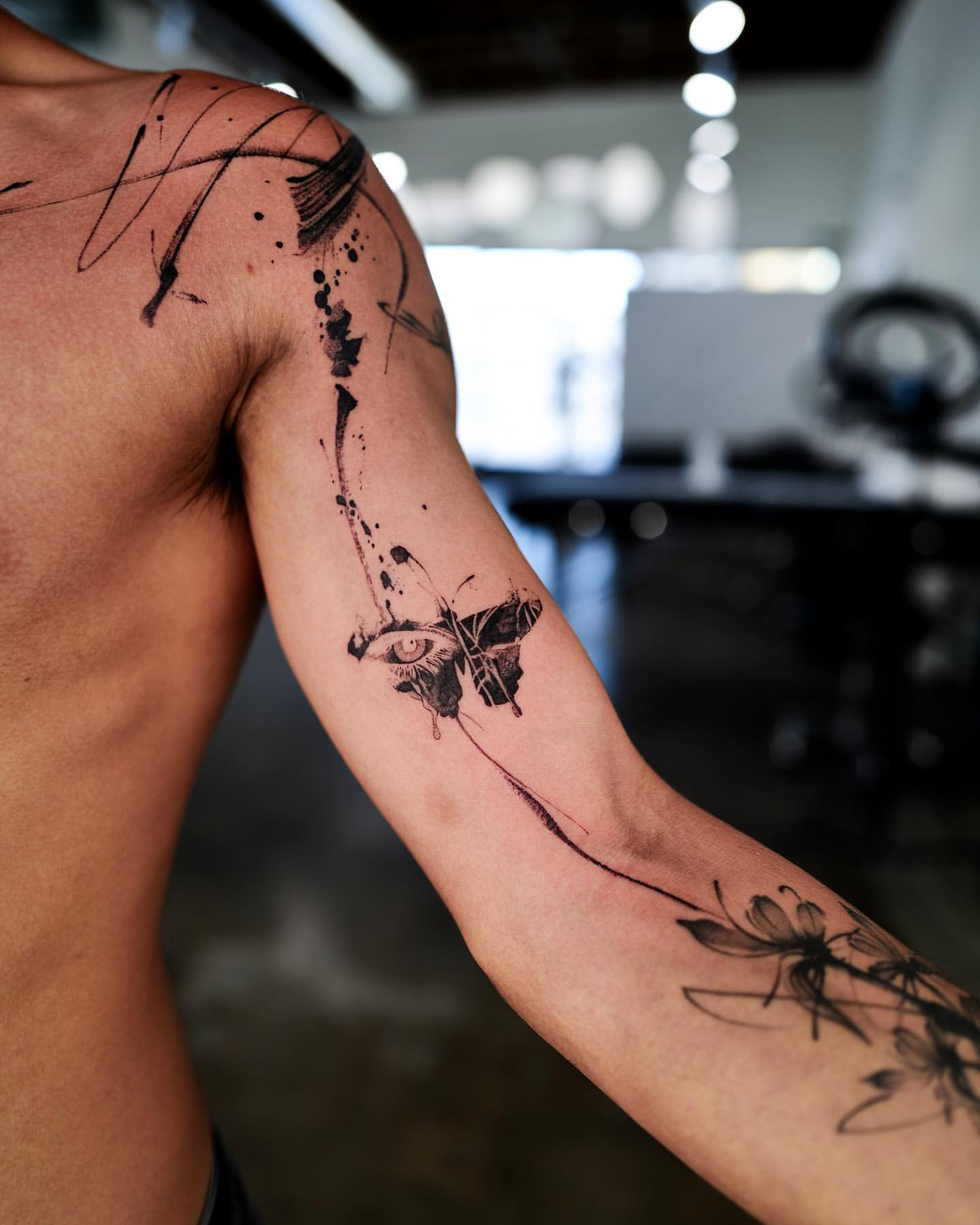 upper arm tattoos for men designs