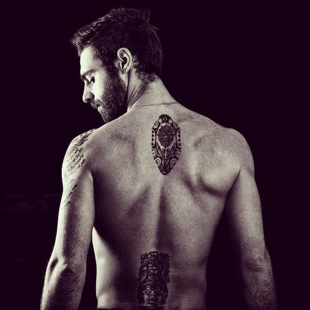 upper back tattoos for men symbolism