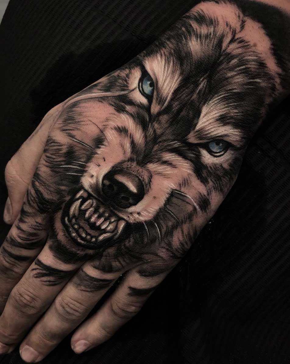 wolf hand tattoos for men designs