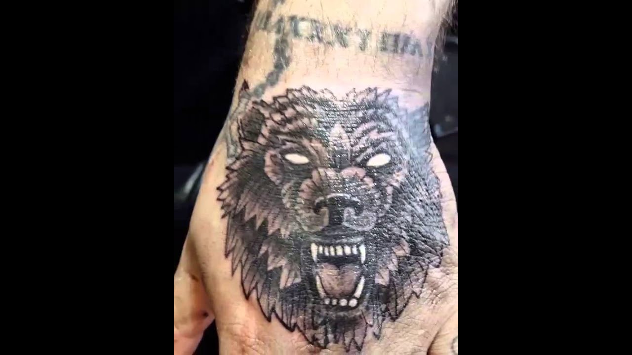 wolf hand tattoos for men 0026