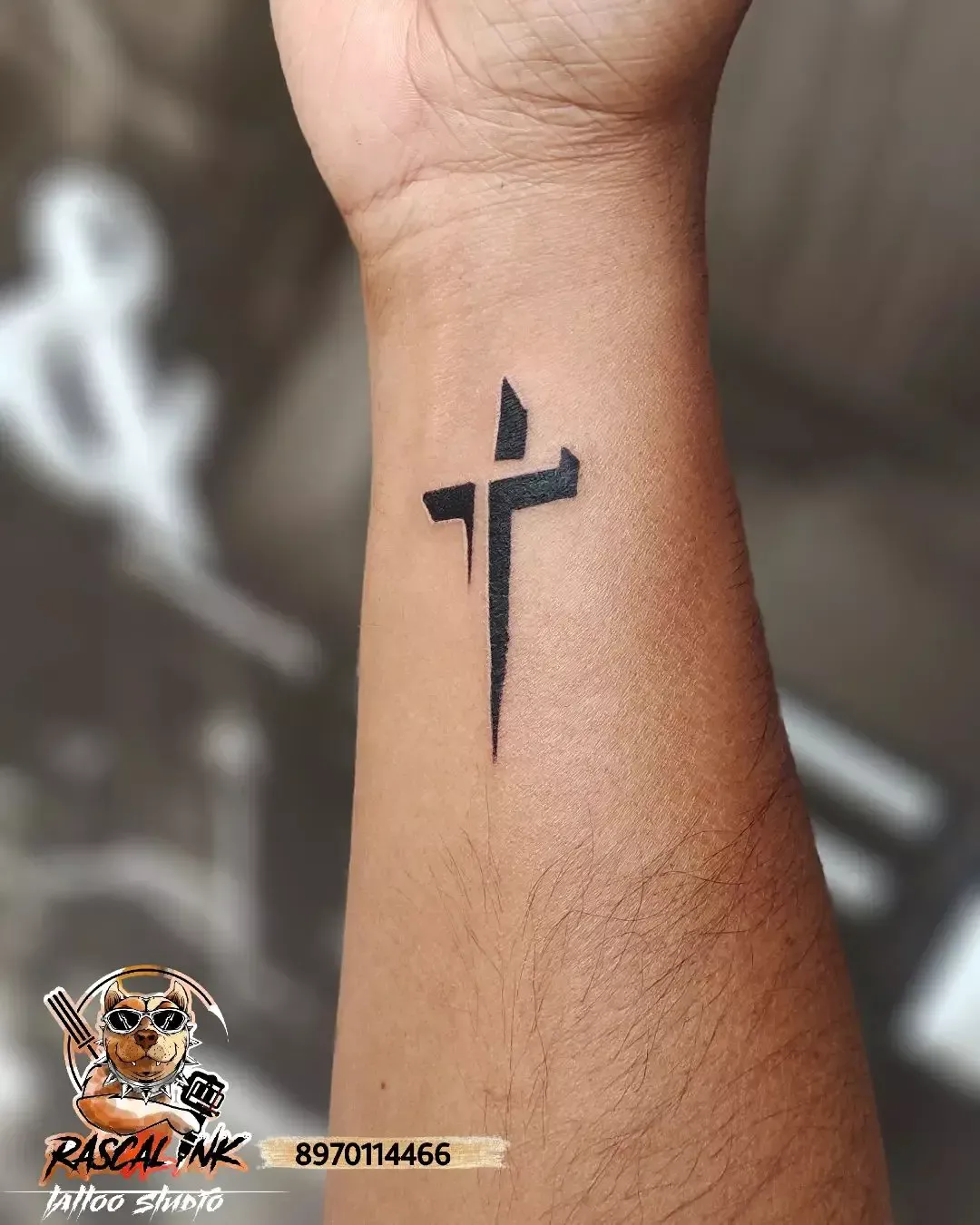 wrist tattoos for men Cross