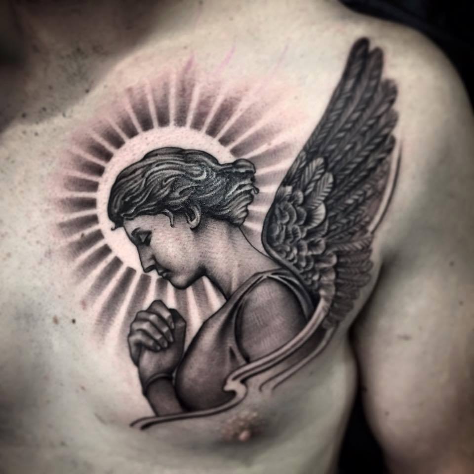 Symbolic angel tattoos for men forearm that convey strength and protection