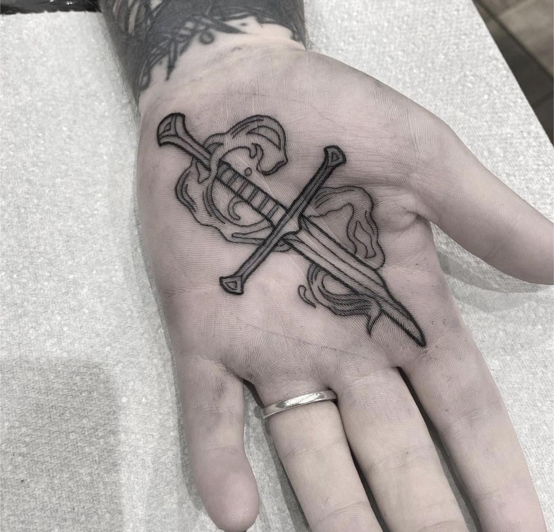 Fresh back tattoos for men sword designs that elevate your style and strength