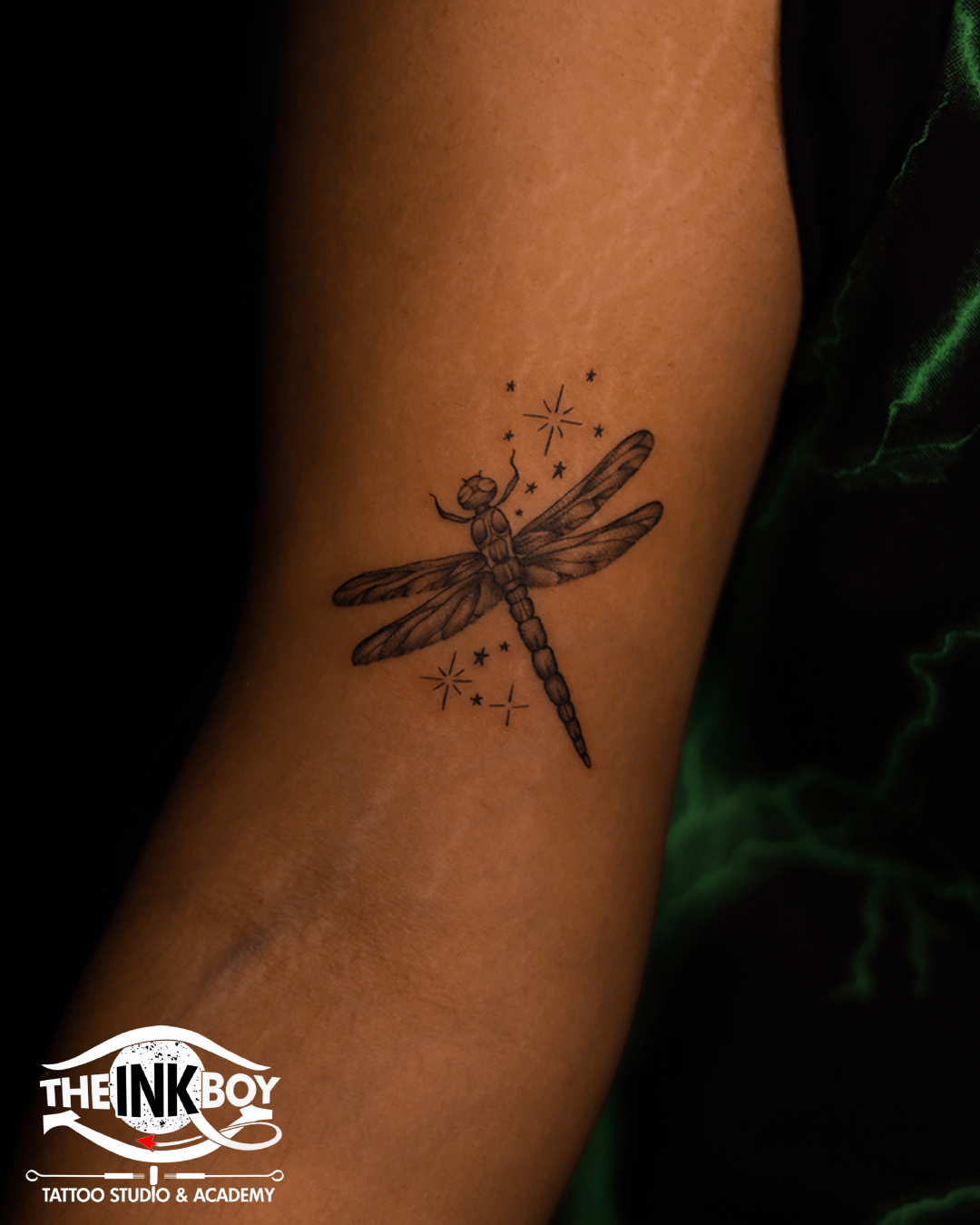 Dragonfly tattoos for men that symbolize transformation and freedom in style