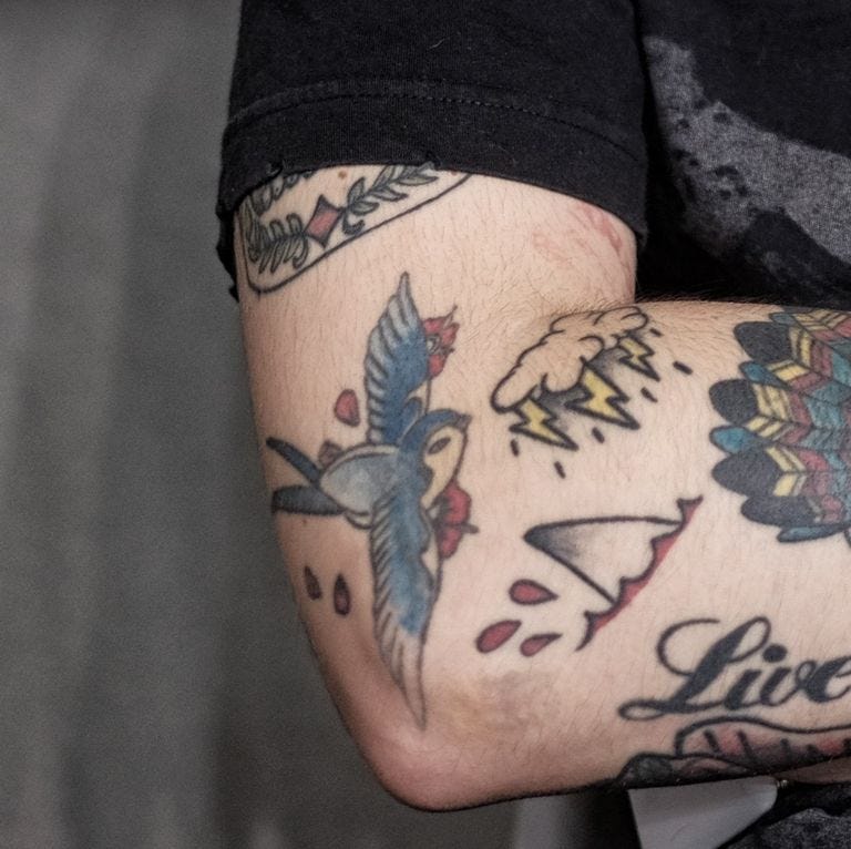 Elbow tattoos for men that are perfect for showcasing your unique style and personality