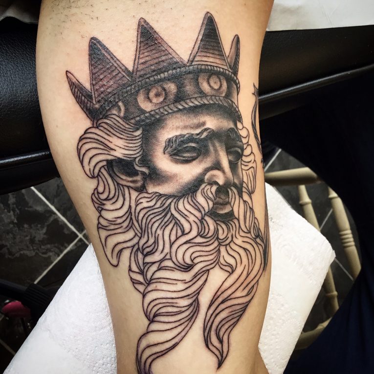 Comfortable and striking greek god tattoos for men to showcase your power