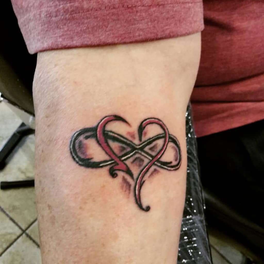 Innovative infinity tattoo for men representing endless strength and style