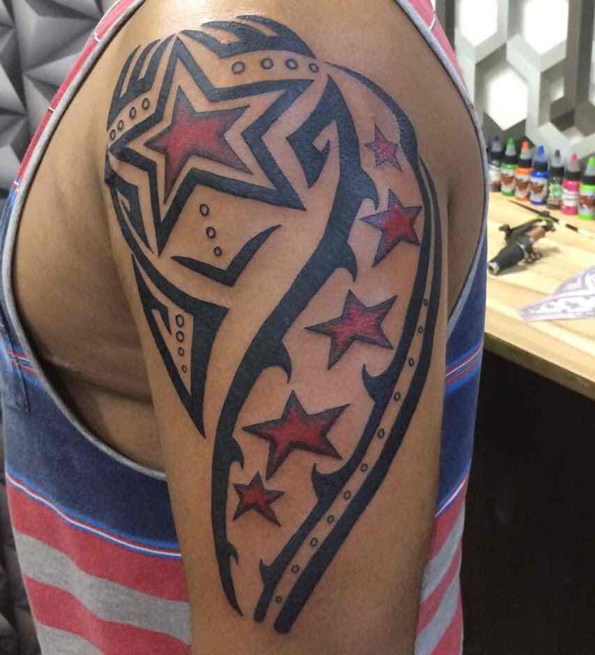 Eye-catching star tattoos for men that showcase your unique style and spirit