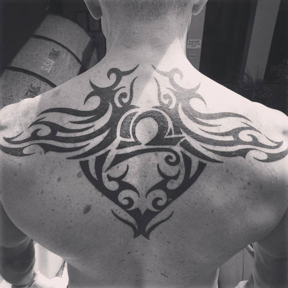 Affordable tribal back tattoos for men that empower your identity and style